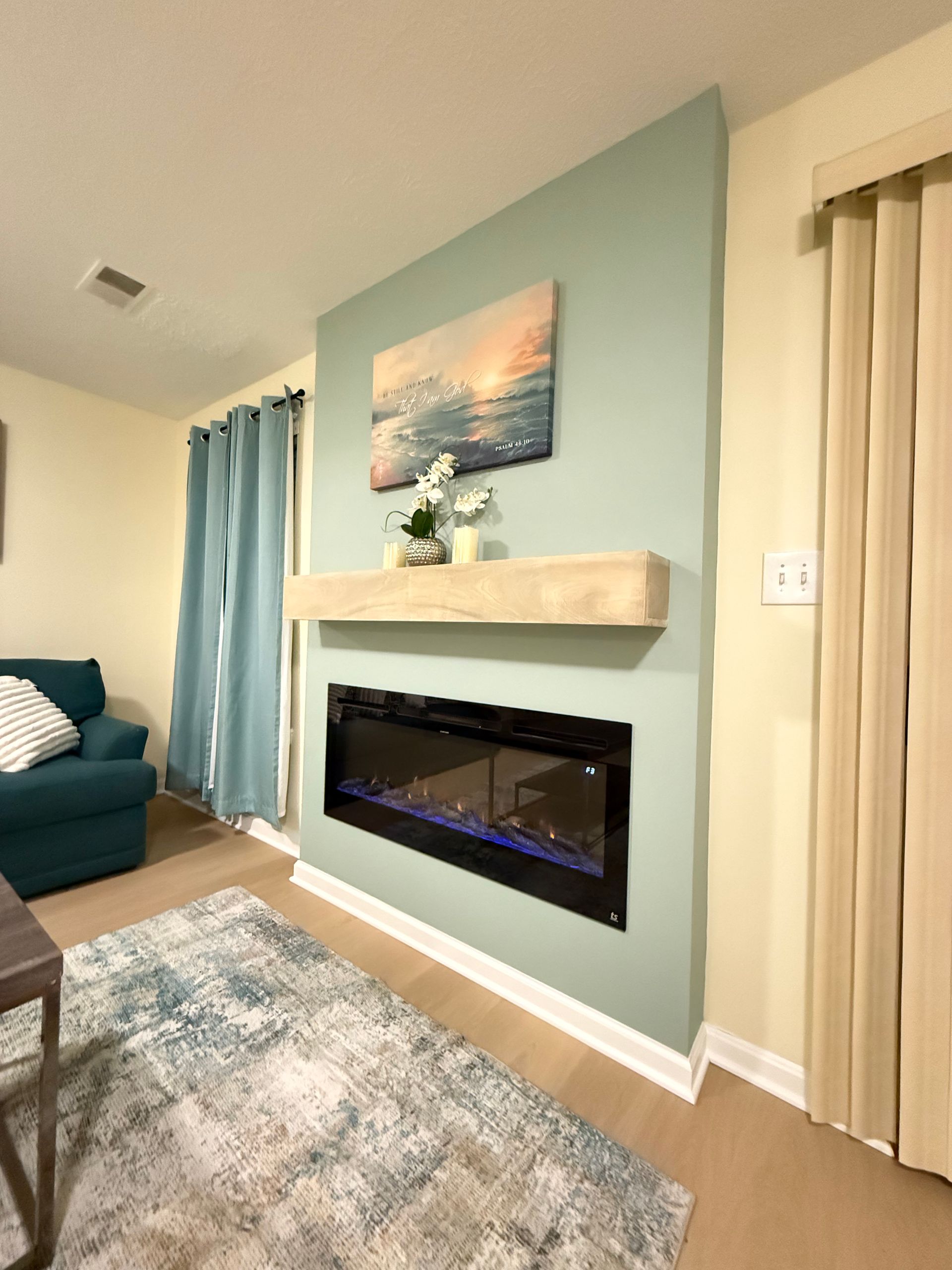 Custom built-in basement fireplace wall showcasing quality finish carpentry.