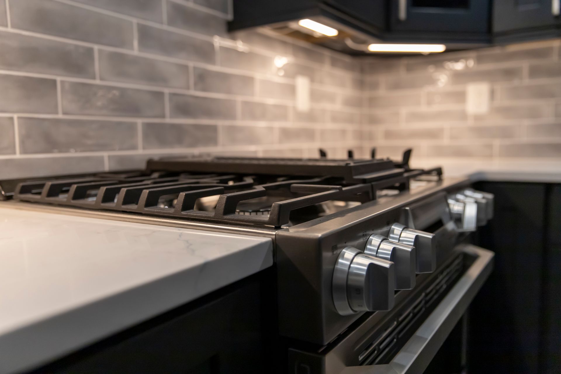 Extended cabinetry on side walls for a cohesive and organized kitchen.