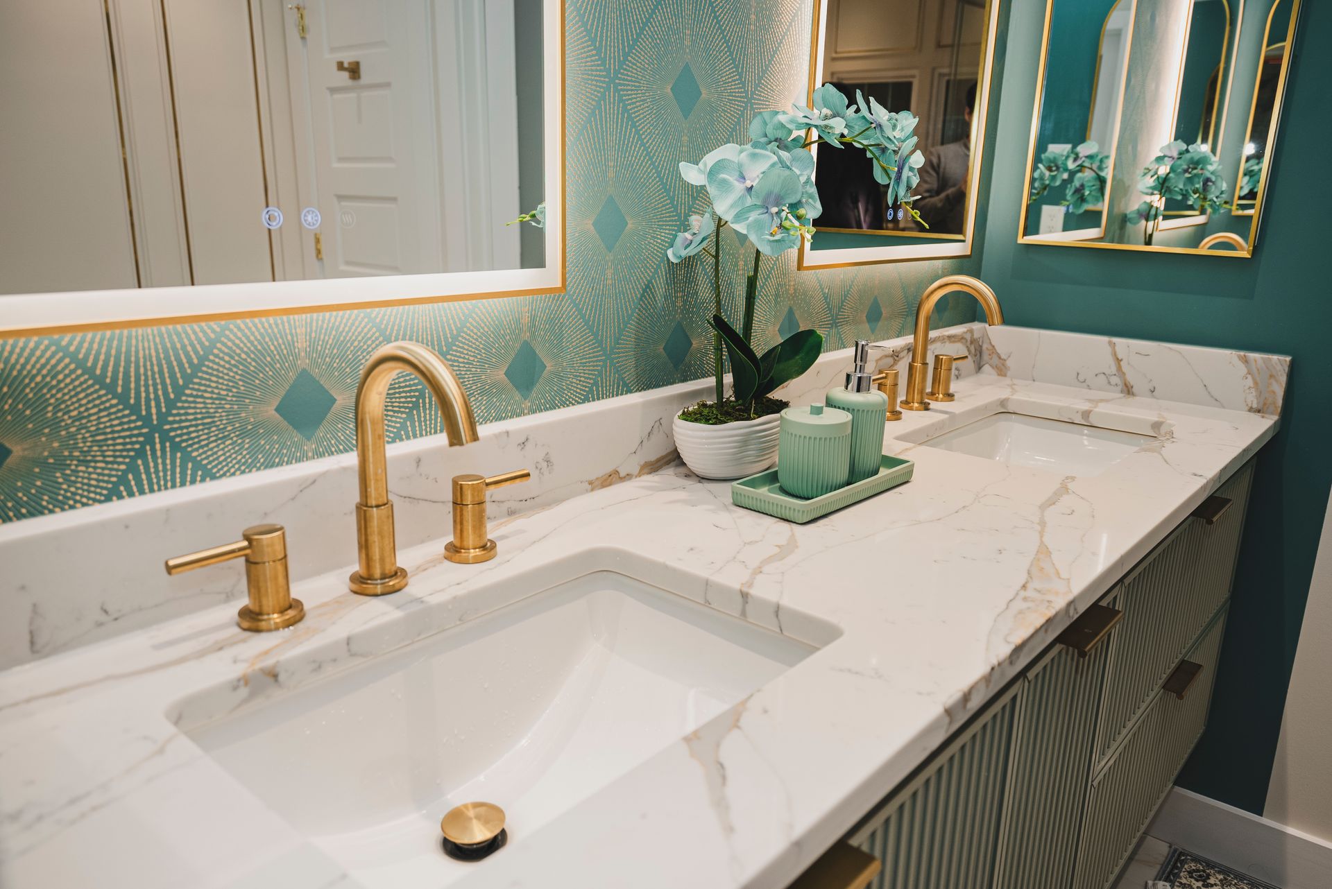 Brushed gold bathroom fixtures and hardware for a luxury finish.