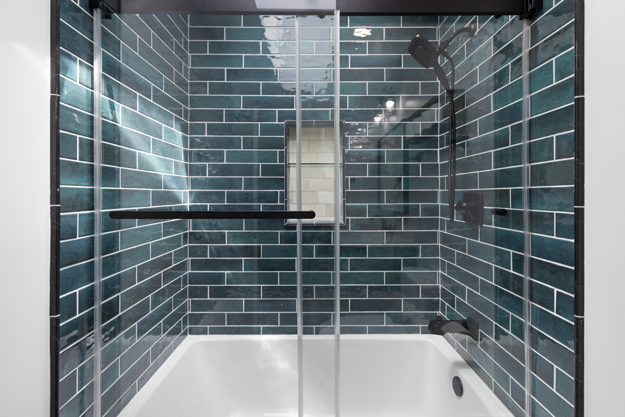 Expert shower installation services in Ellicott City, MD, featuring durable glass enclosures and stylish subway tile work.