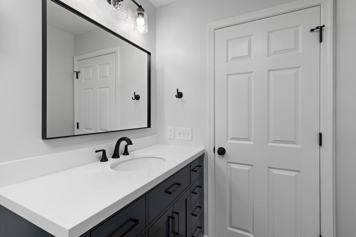Quality vanity installation for modern bathrooms in Ellicott City, MD, complete with sleek cabinetry and elegant countertops.