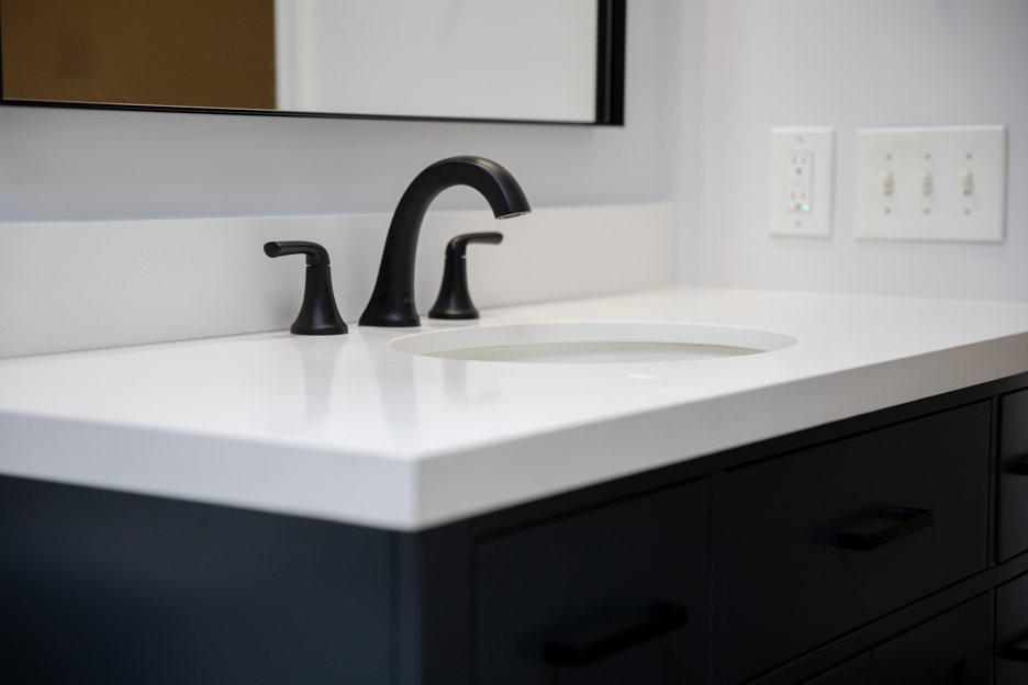 Durable countertop installation for bathrooms in Ellicott City, MD, perfectly paired with new sinks and faucets.