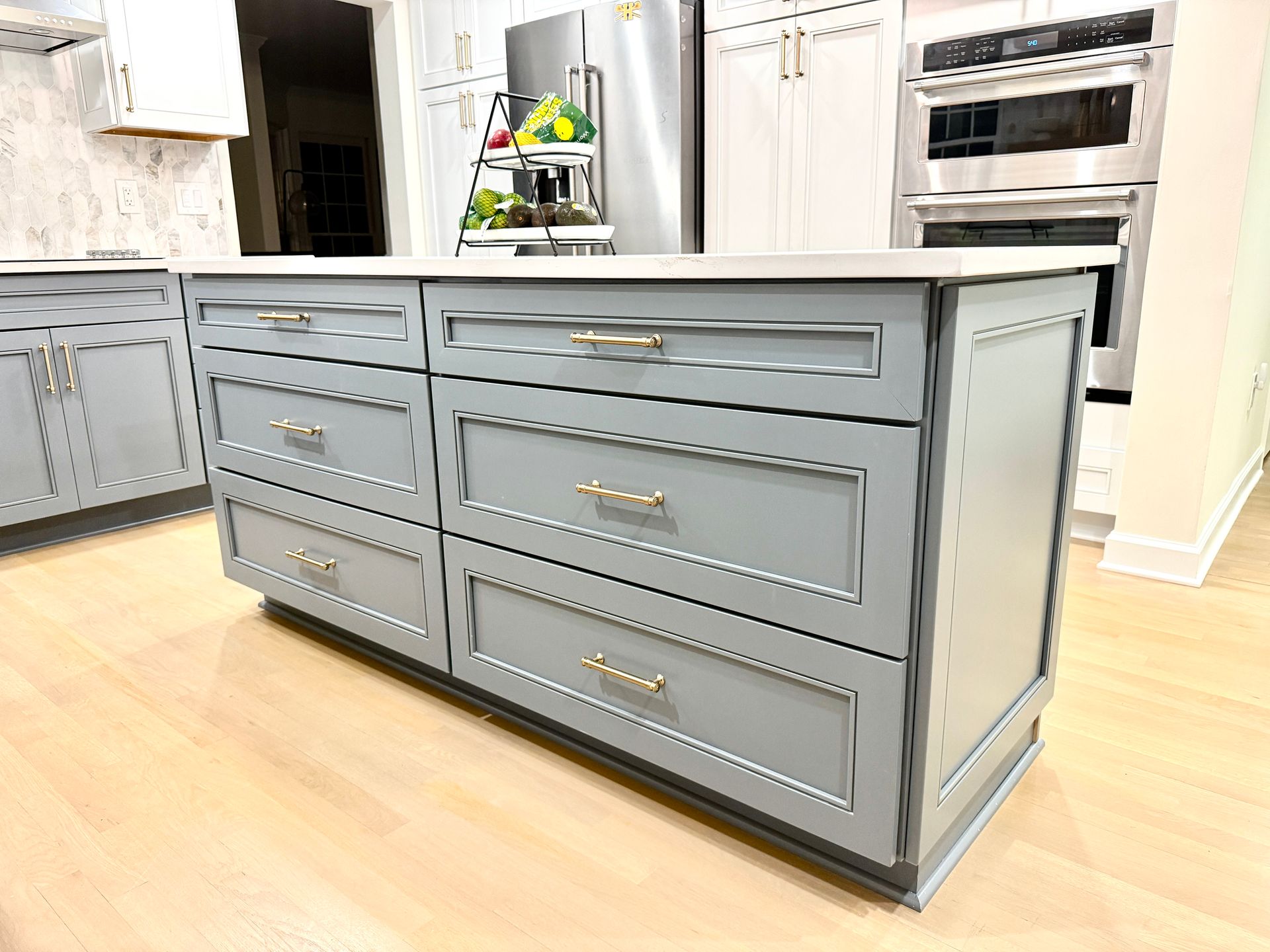 Perfectly installed kitchen crown molding and trim, demonstrating expert finish carpentry.