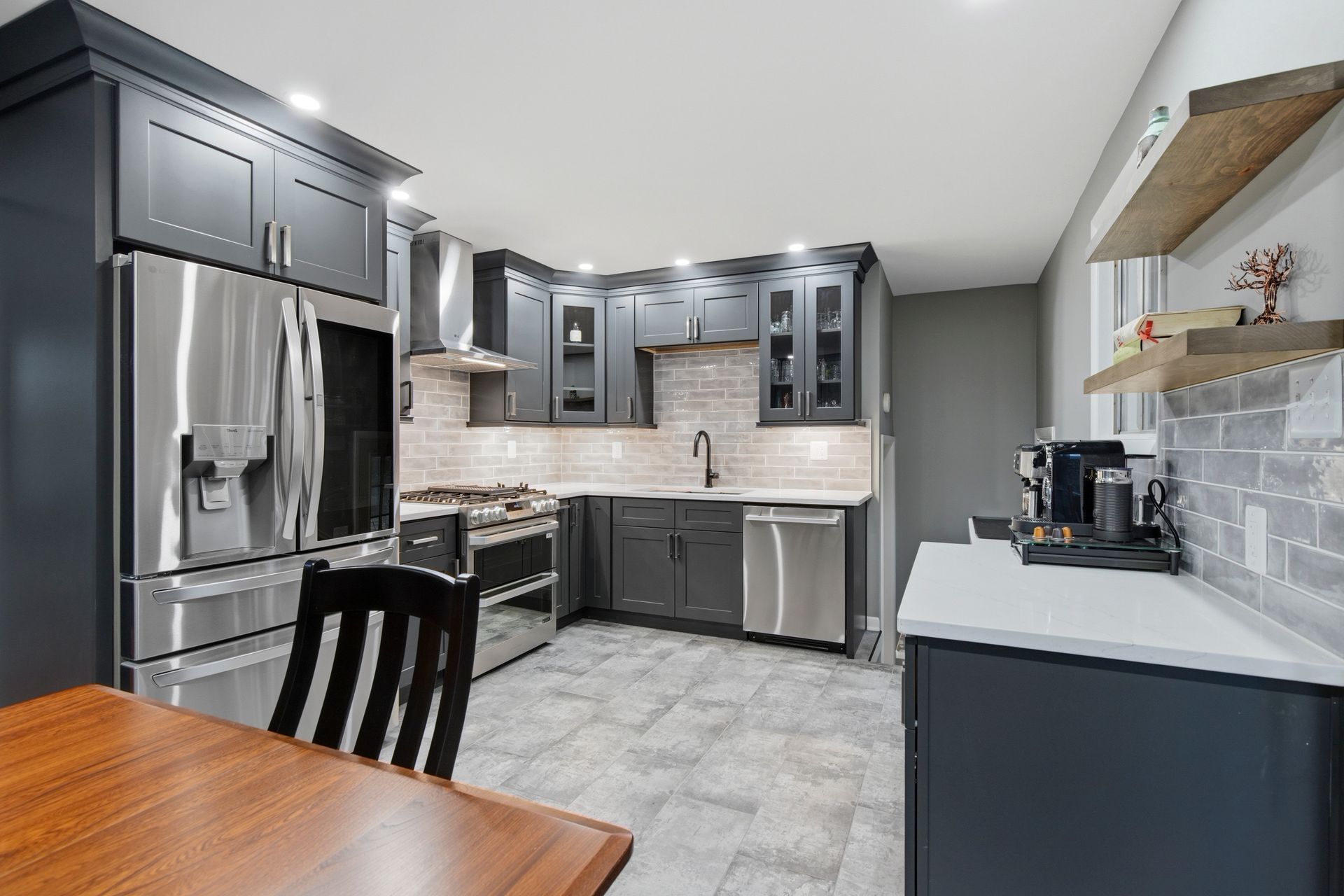 Professional kitchen transformation featuring modern cabinetry and finishes.