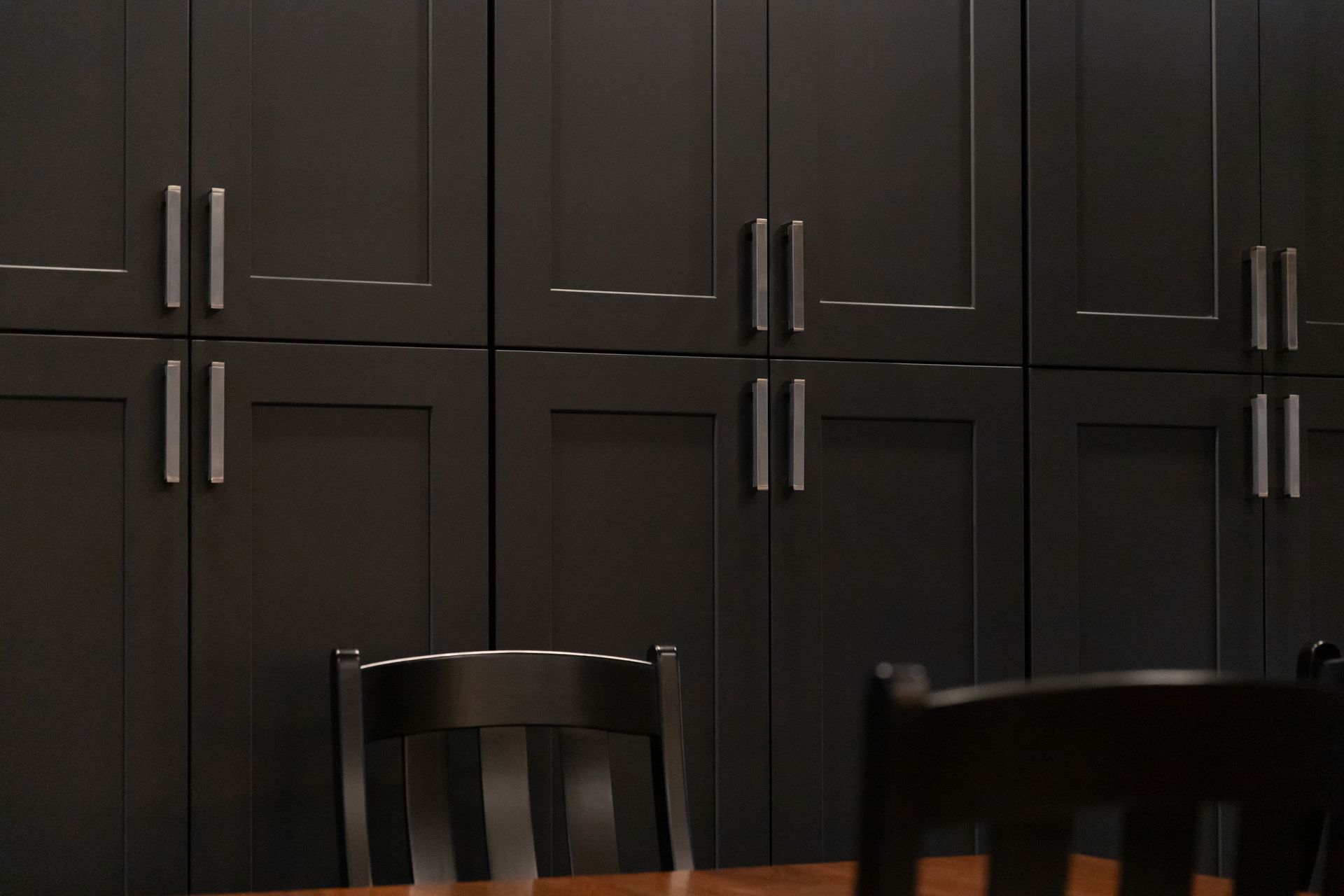 Removing soffits and bulkheads to install taller, spacious wall cabinets.