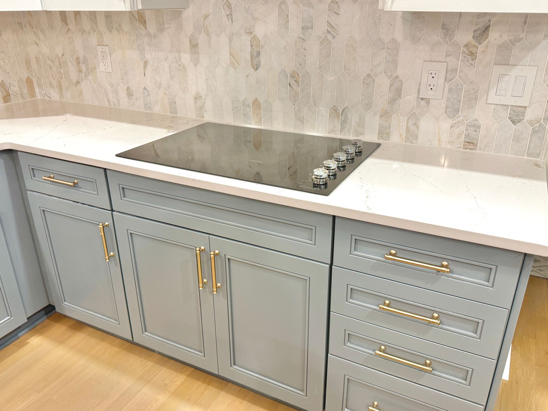 Integrated refrigerator and built-in oven cabinet installation, achieving seamless appliance integration.