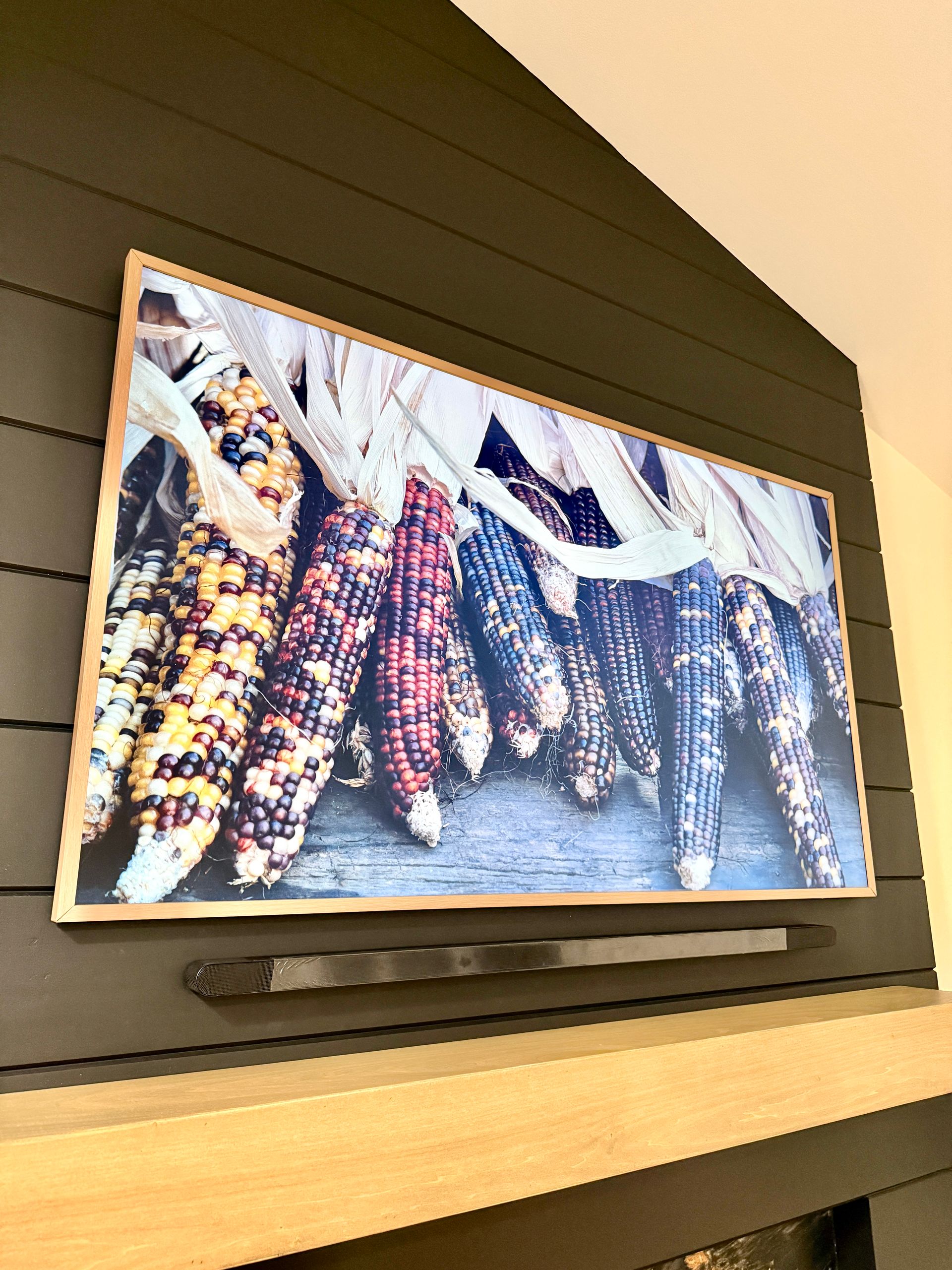 Custom Fireplace Surround installation and TV mounting beneath vaulted ceiling in Monkton, MD.