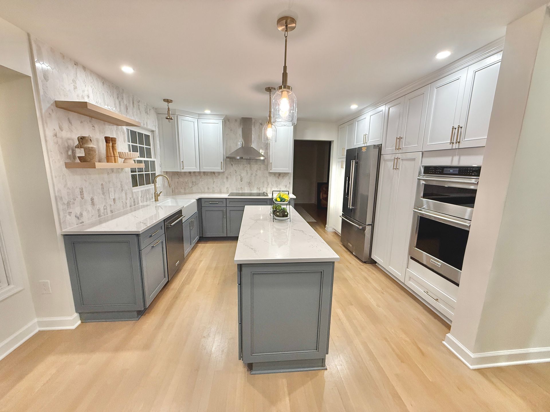 Custom built-in appliance wall and cabinetry installed with expert precision in Monkton kitchen.