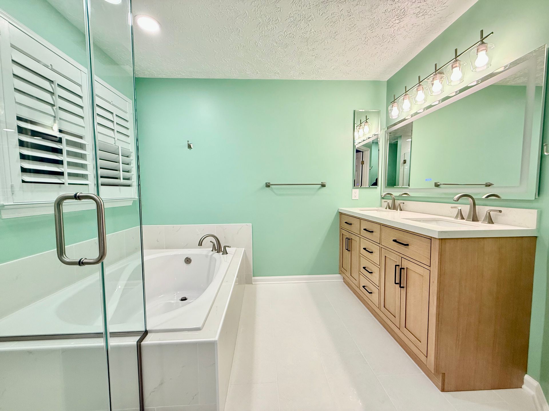 Finished custom cabinet installation and double sink vanity work, showcasing our quality carpentry.