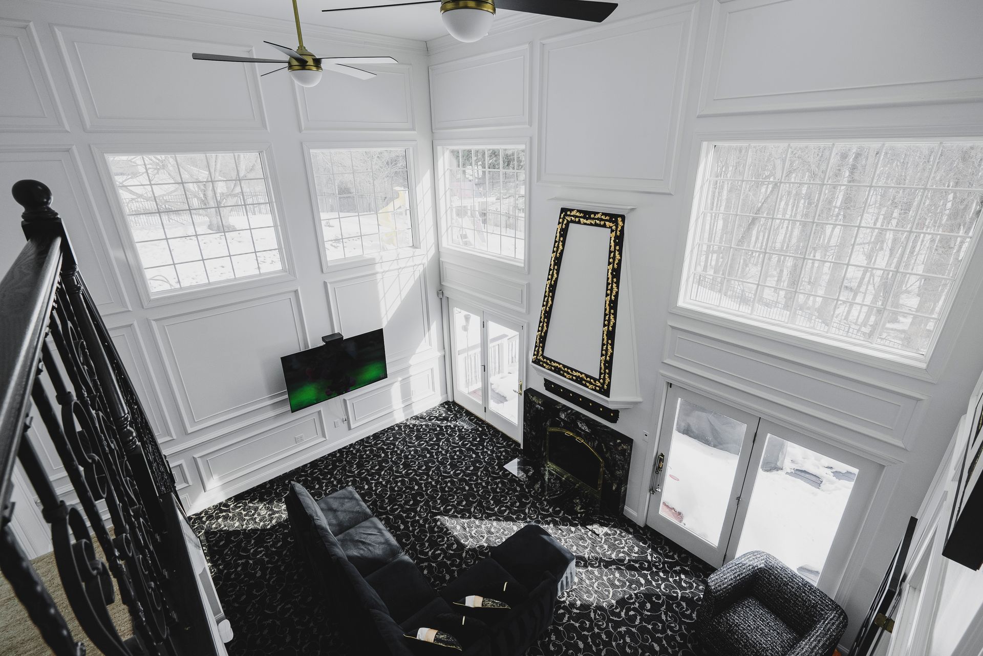 Symmetrical artisan wall moldings that elevate the interior design of a residential living space.