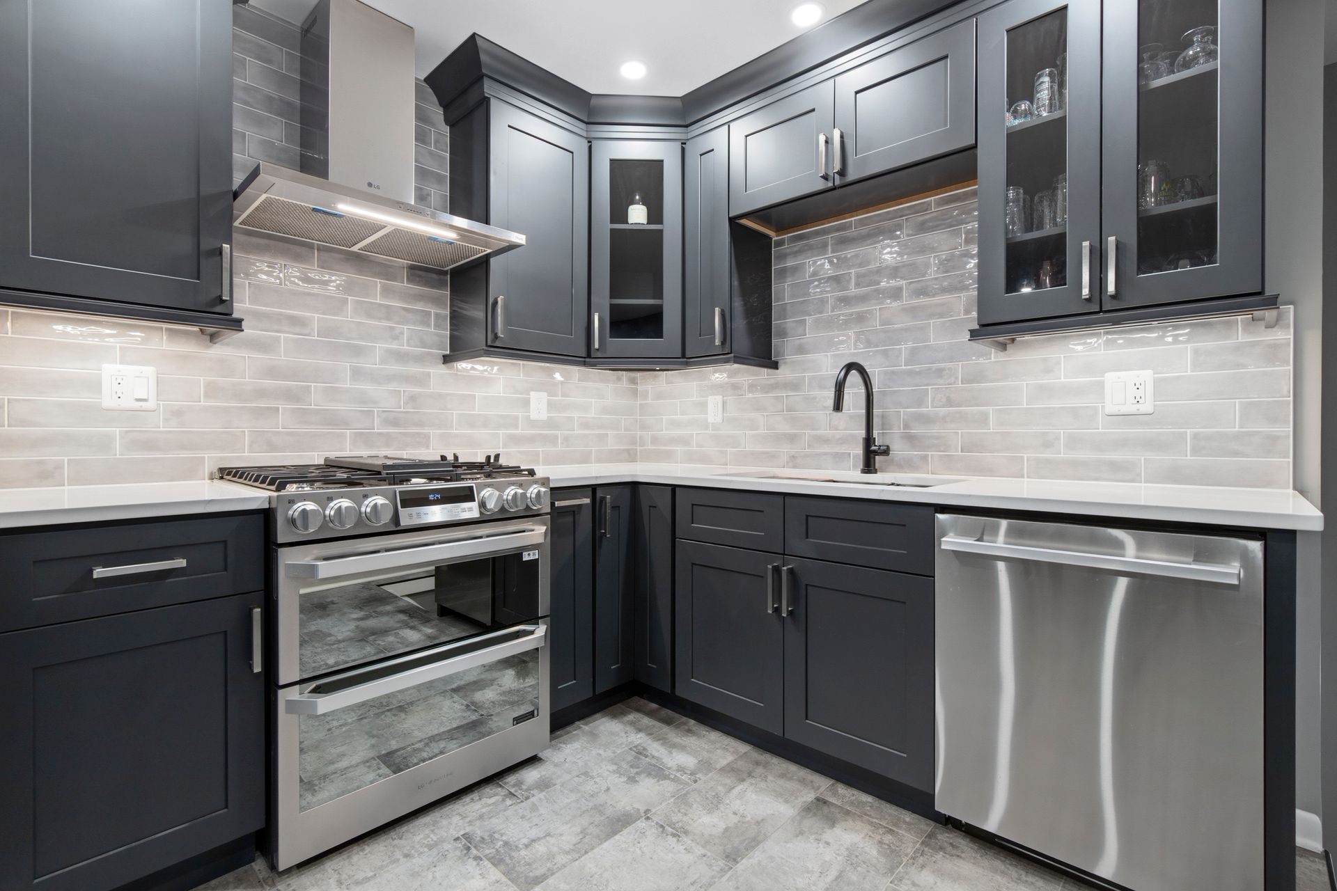 Structural kitchen updates to increase wall cabinet height and storage.