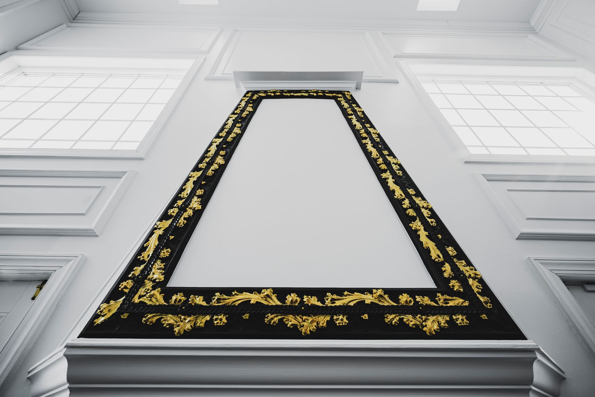 High-end quartz stone slab used as a contemporary backsplash for a handcrafted wood fireplace surround.