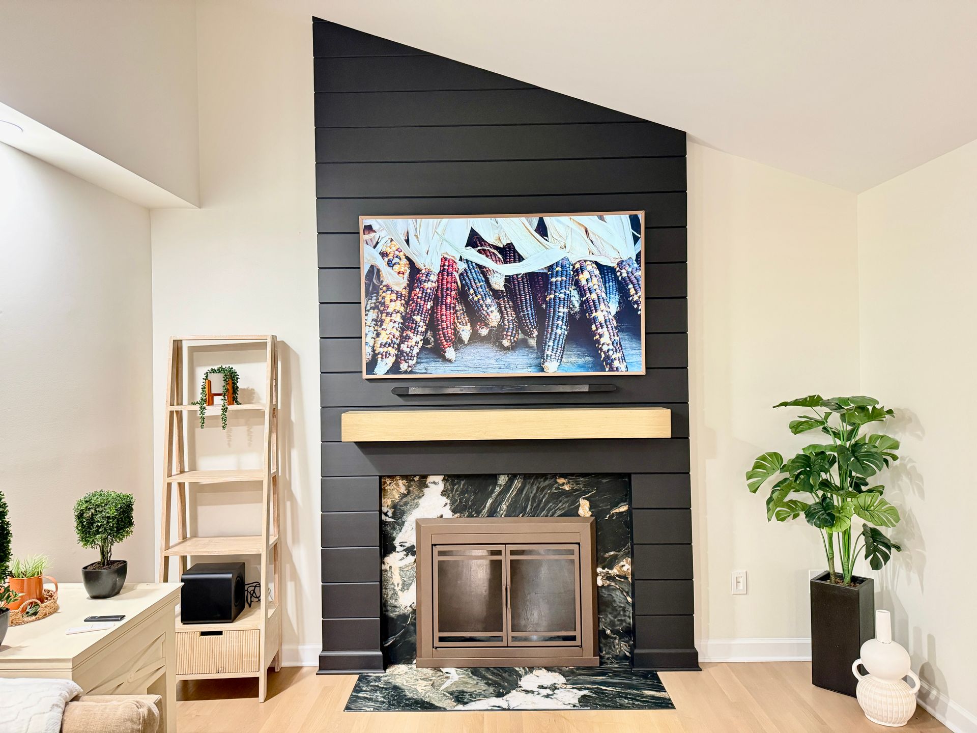 Monkton living room remodel showcasing custom fireplace as the main architectural focal point.