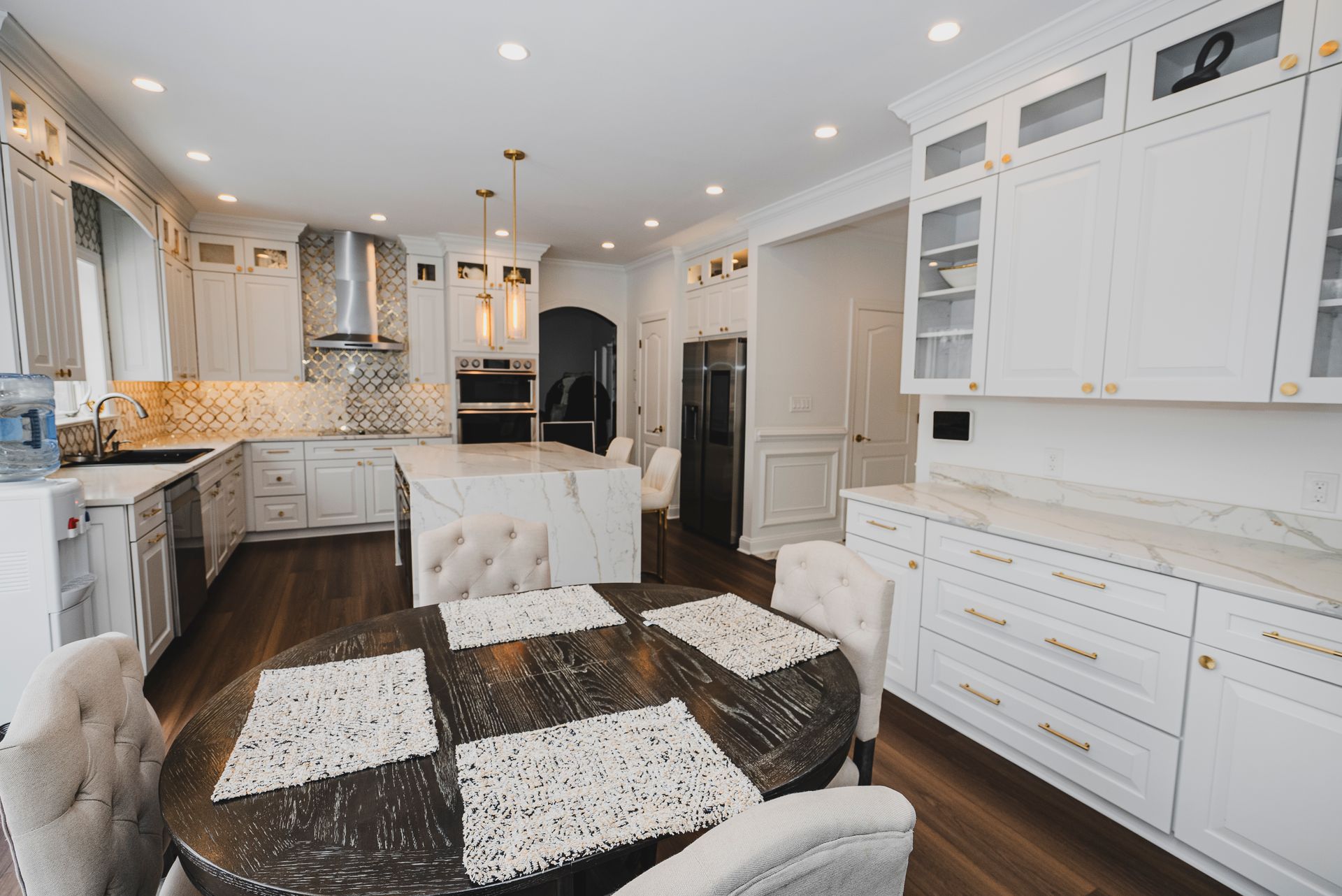 Tailored kitchen design featuring seamless cabinetry and modern surfaces.
