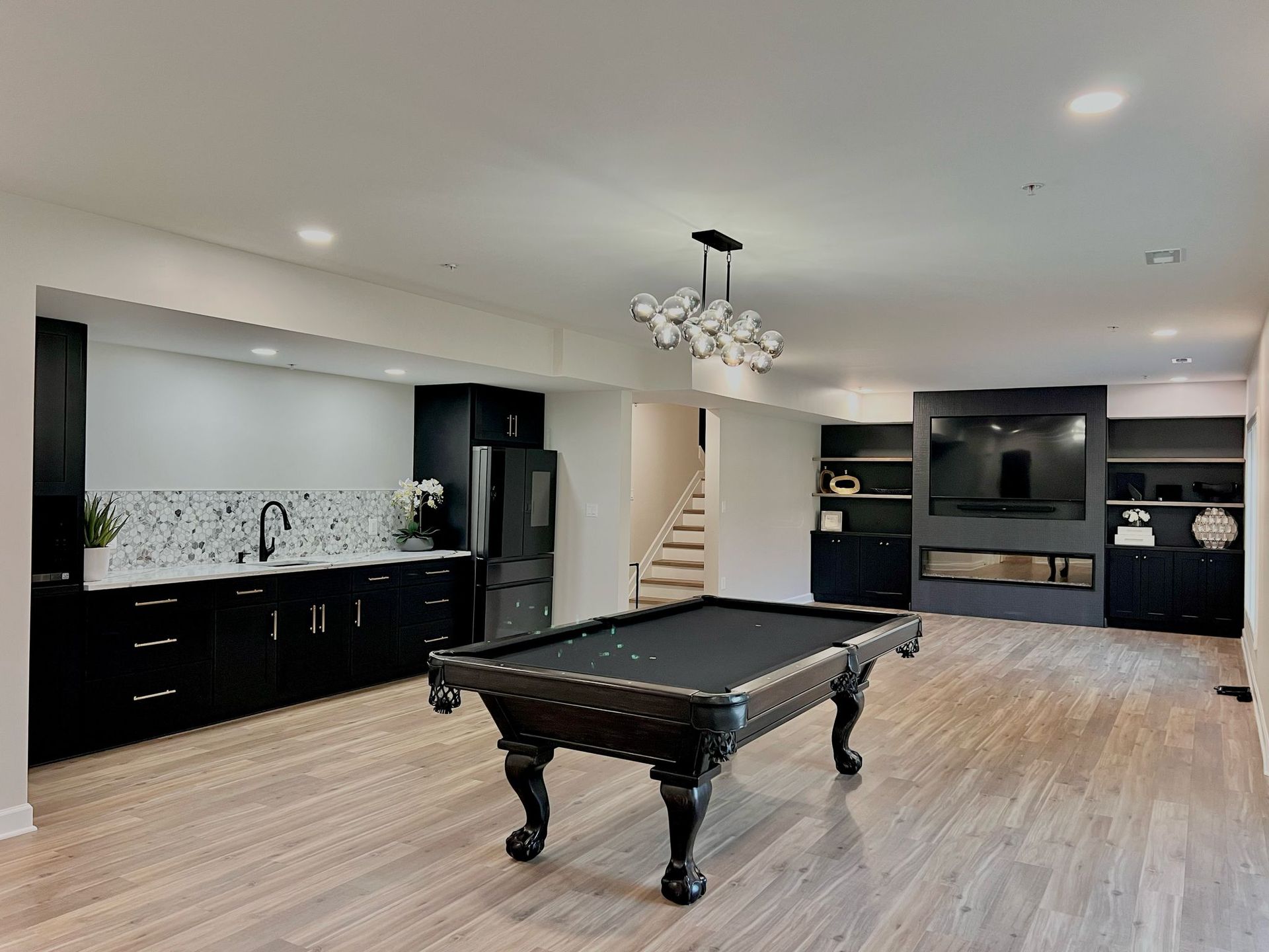 Custom basement remodel featuring expert layout optimization and high-quality structural finishing.