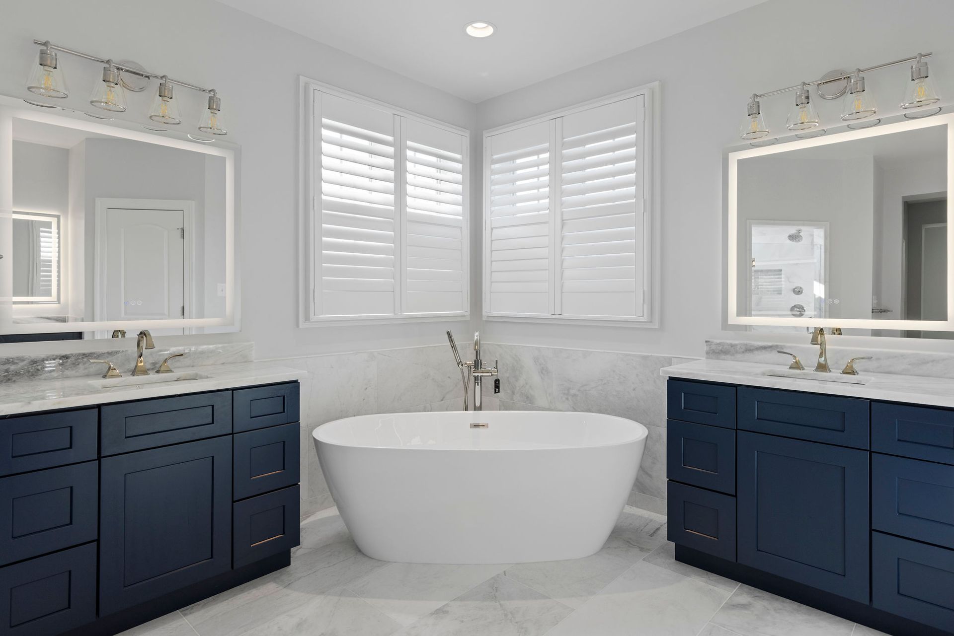 Installing space-saving floating vanities and updating plumbing fixtures for Baltimore City, MD rowhomes.