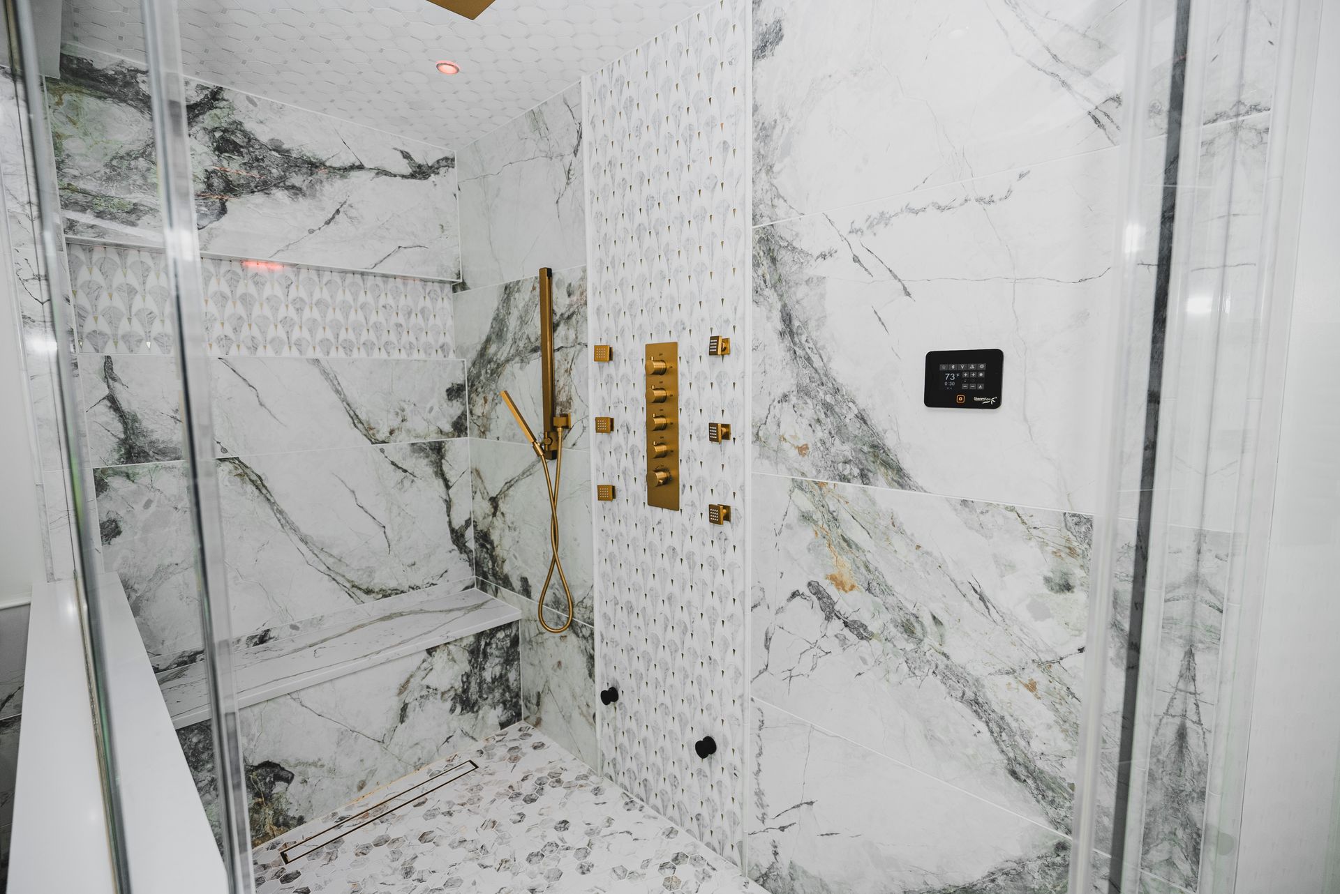 Modern master bathroom renovation with open concept floor plan.