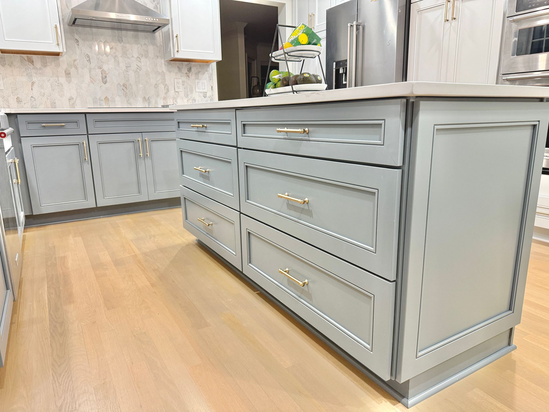 Large kitchen island with seamless quartz countertop installation in Monkton, MD.