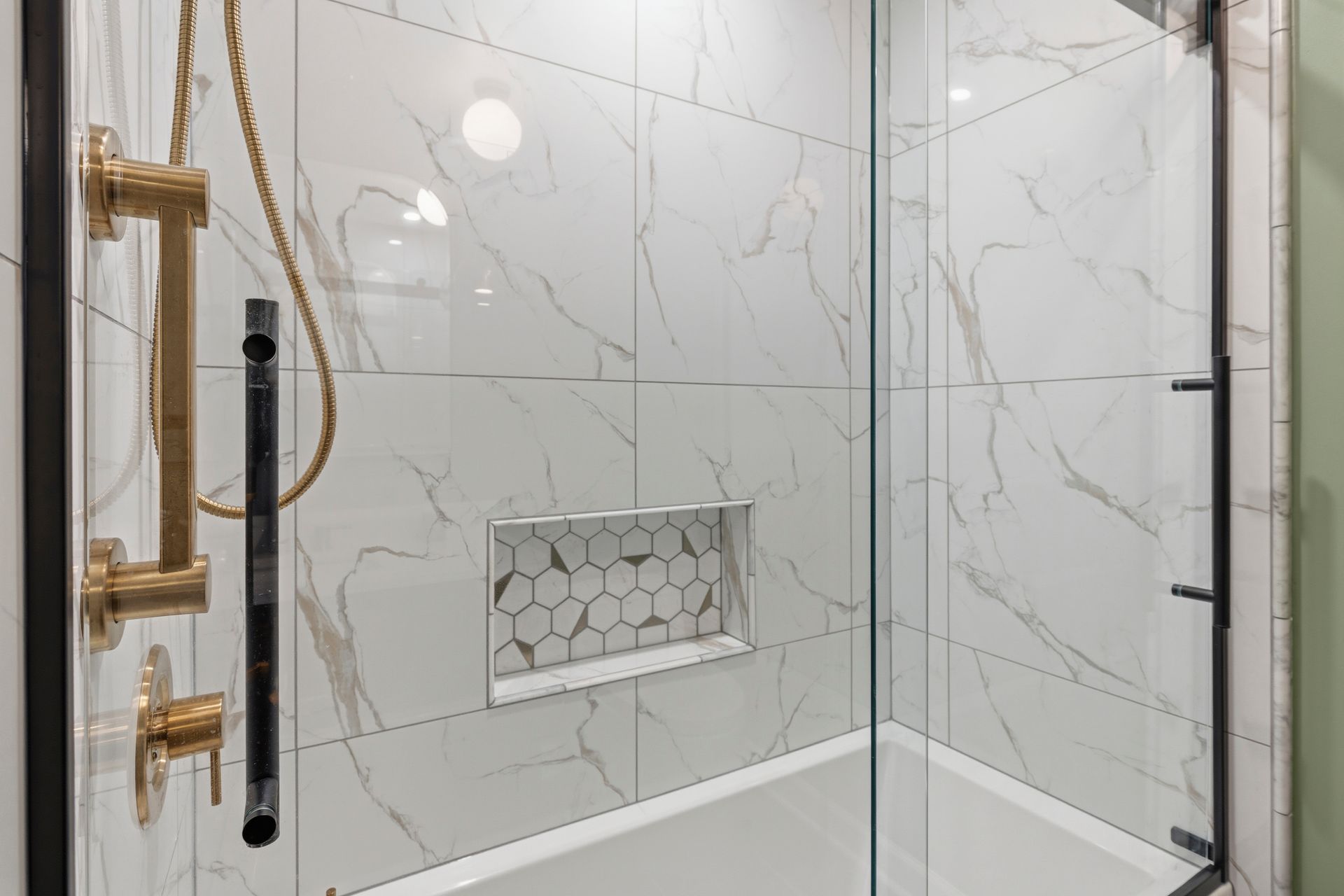 High end residential bathroom renovation highlighting contemporary design elements