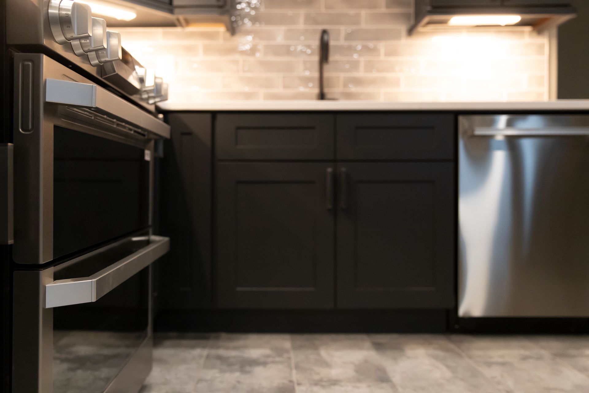 Sleek stainless steel appliances installed during a full kitchen remodel.