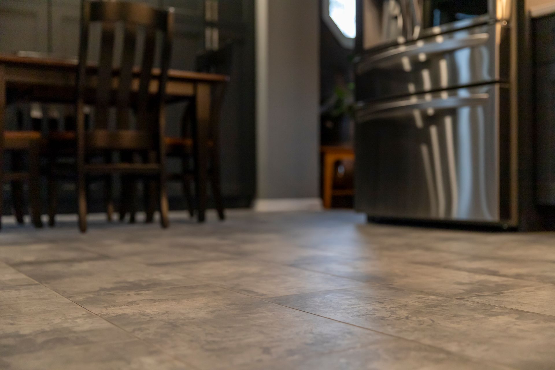 Utilizing bare side and back walls for additional kitchen storage units.