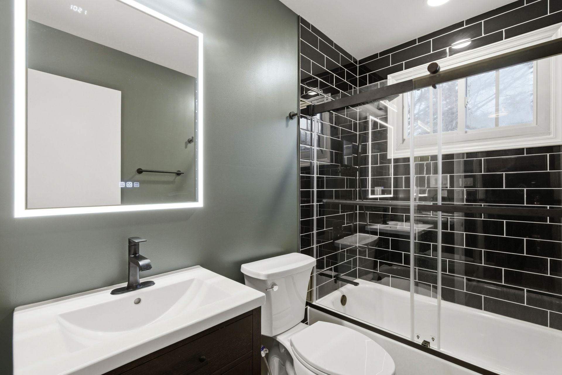Contemporary bathroom update with new flooring and a clean aesthetic.
