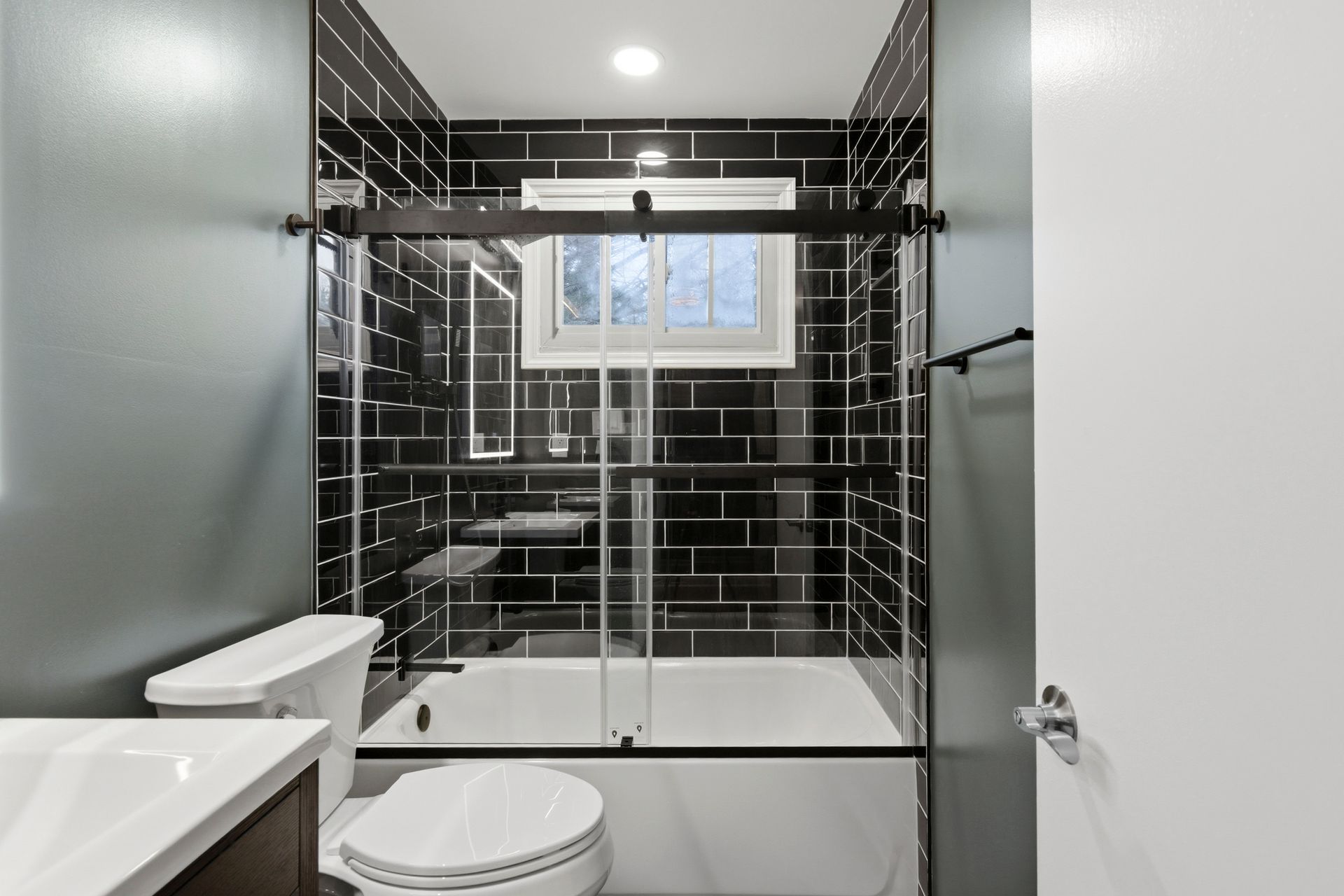 Sleek, modern shower design with professional waterproofing and tiling.