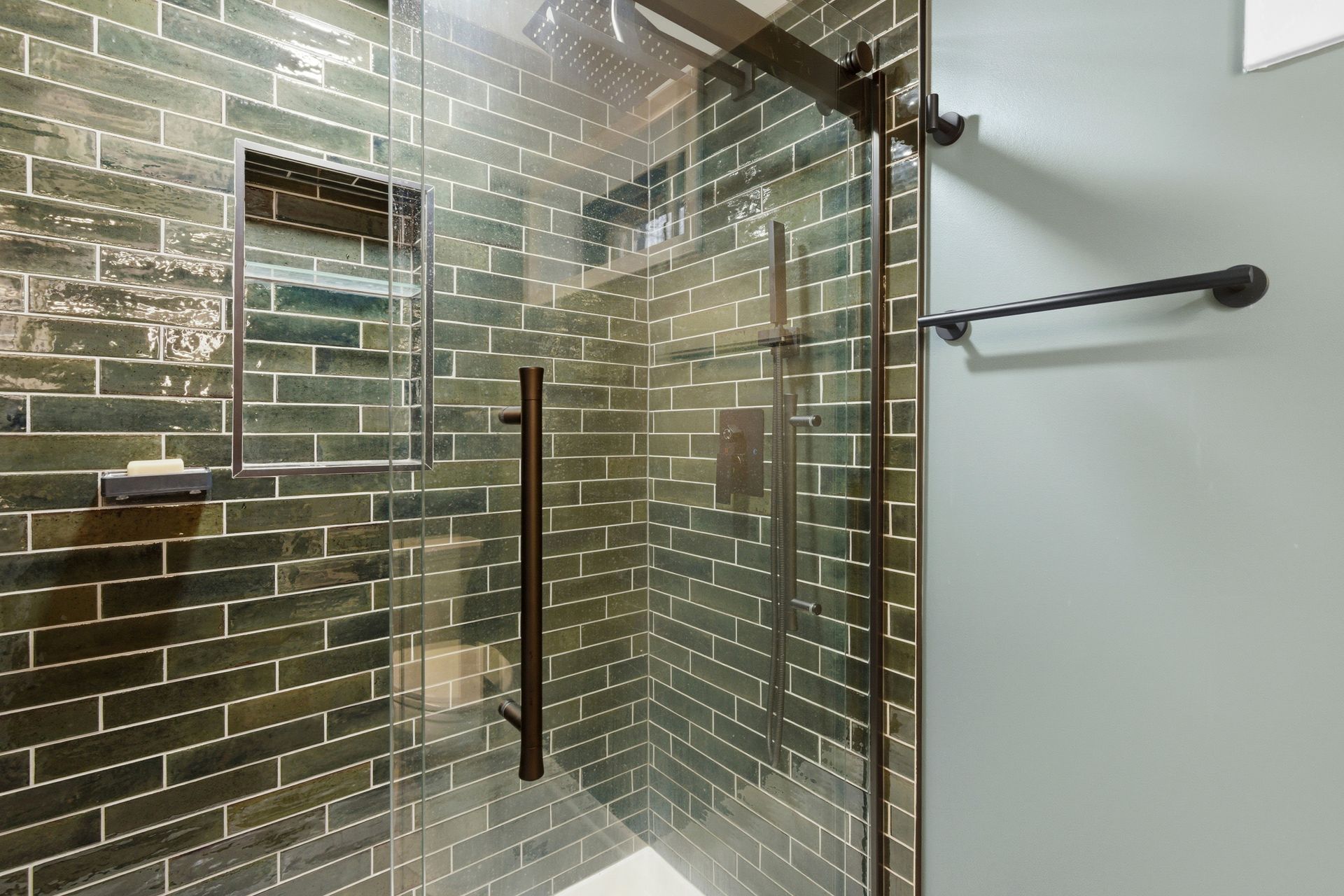 Professional basement conversion into a livable suite with a full bathroom.