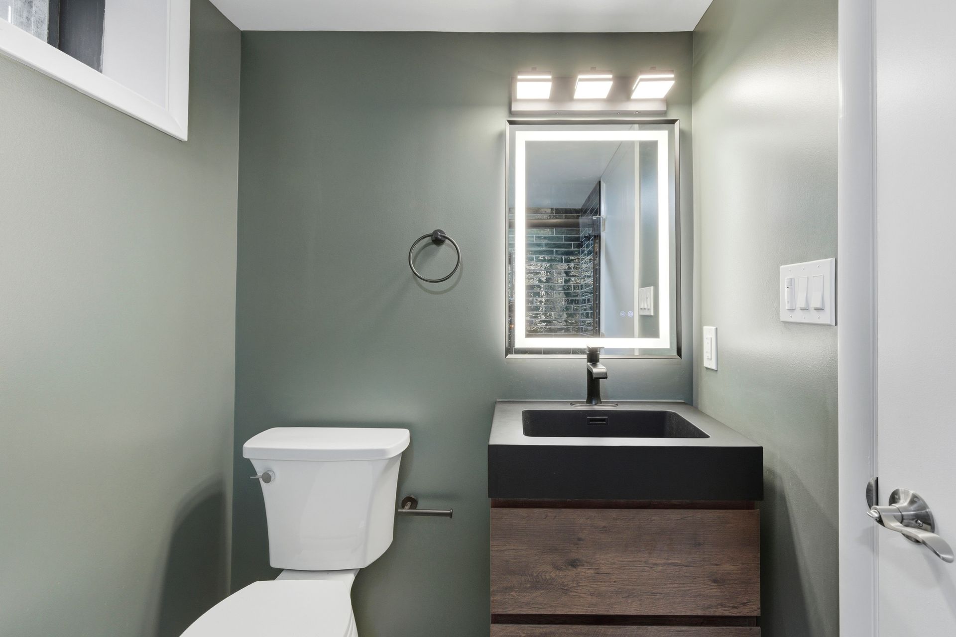 A complete bathroom refresh with updated fixtures, tiling, and flooring.