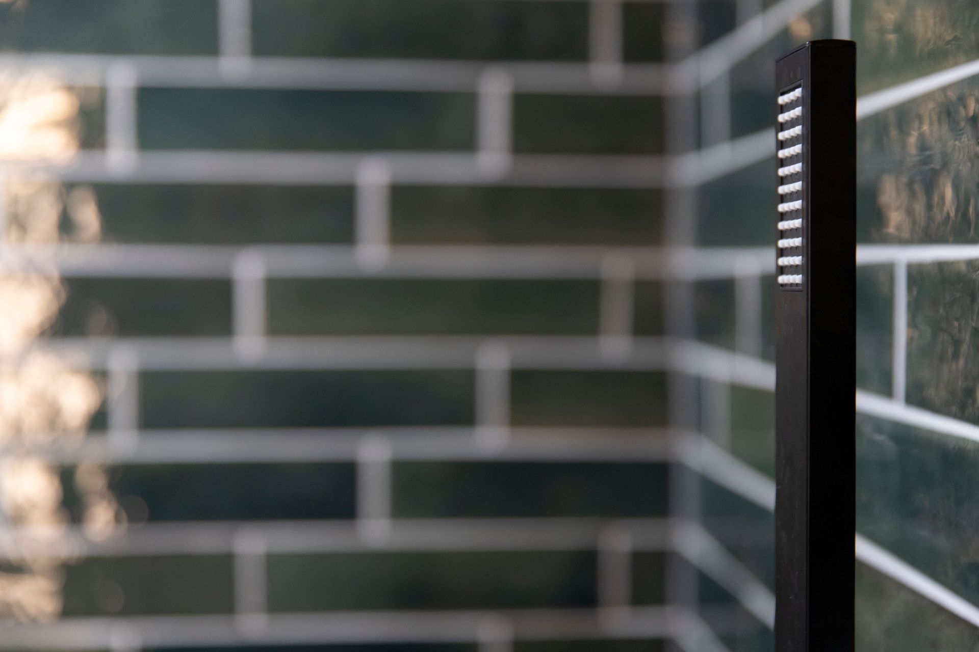 Glass Shower Partition: Seamless glass panel installation for a modern walk-in shower.