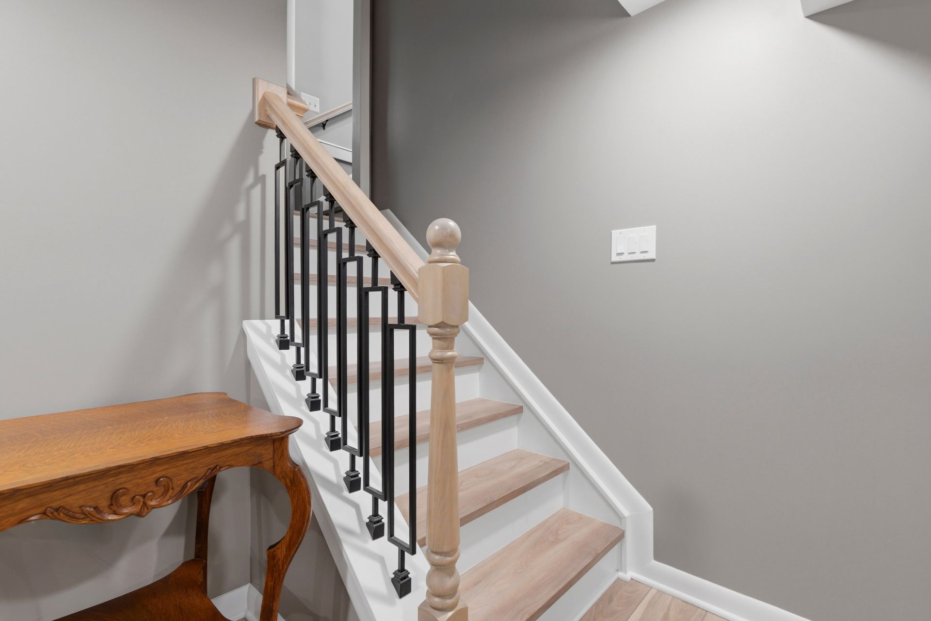 Integrated home design featuring a modernized kitchen and a fully finished lower level.