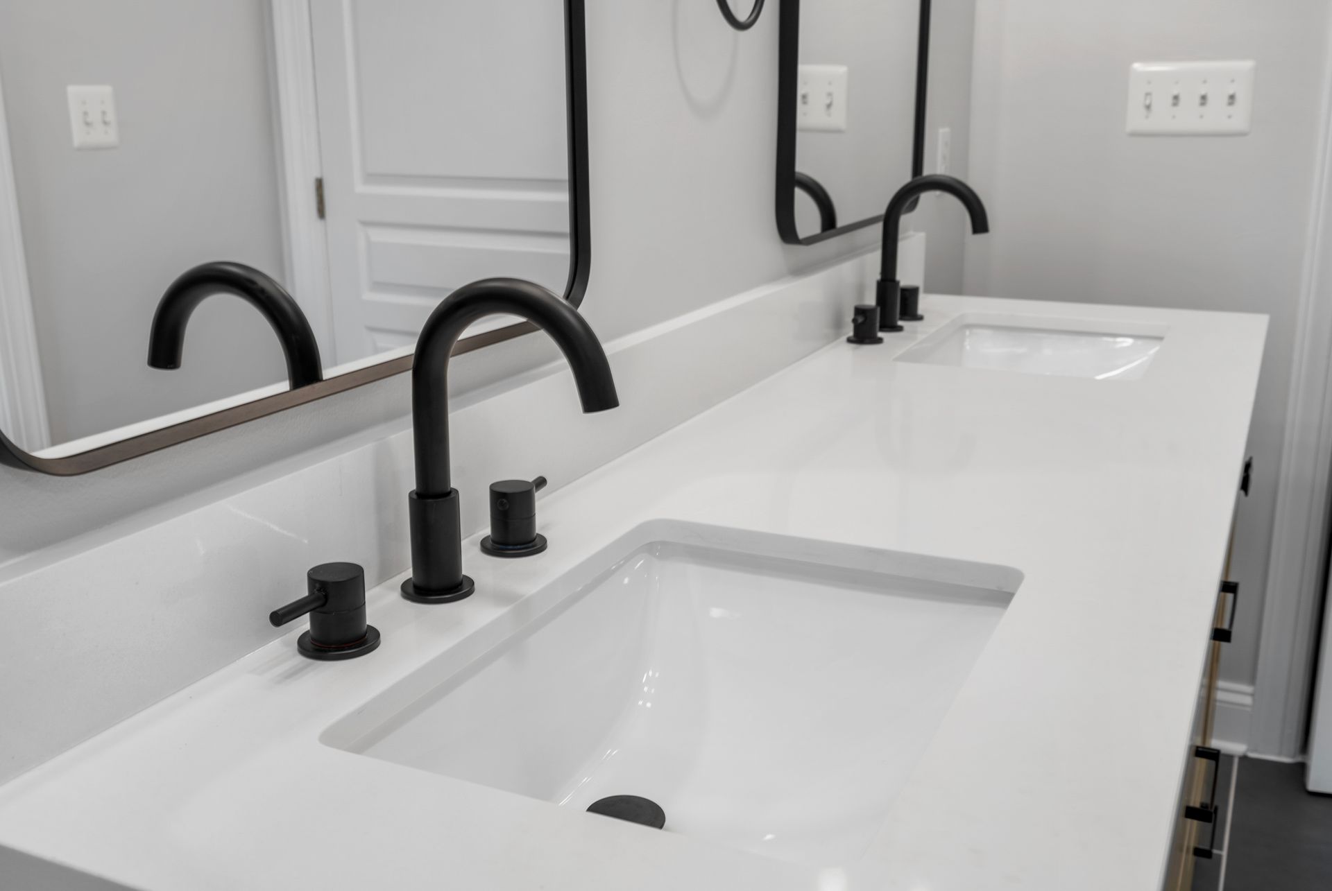 Frameless glass shower enclosure that replaced an old, unused bathtub