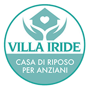 Logo circolare per la casa di riposo Villa Iride, con un'icona raffigurante una casa color verde acqua e un cuore sorretto da mani, sopra un testo su sfondo bianco.