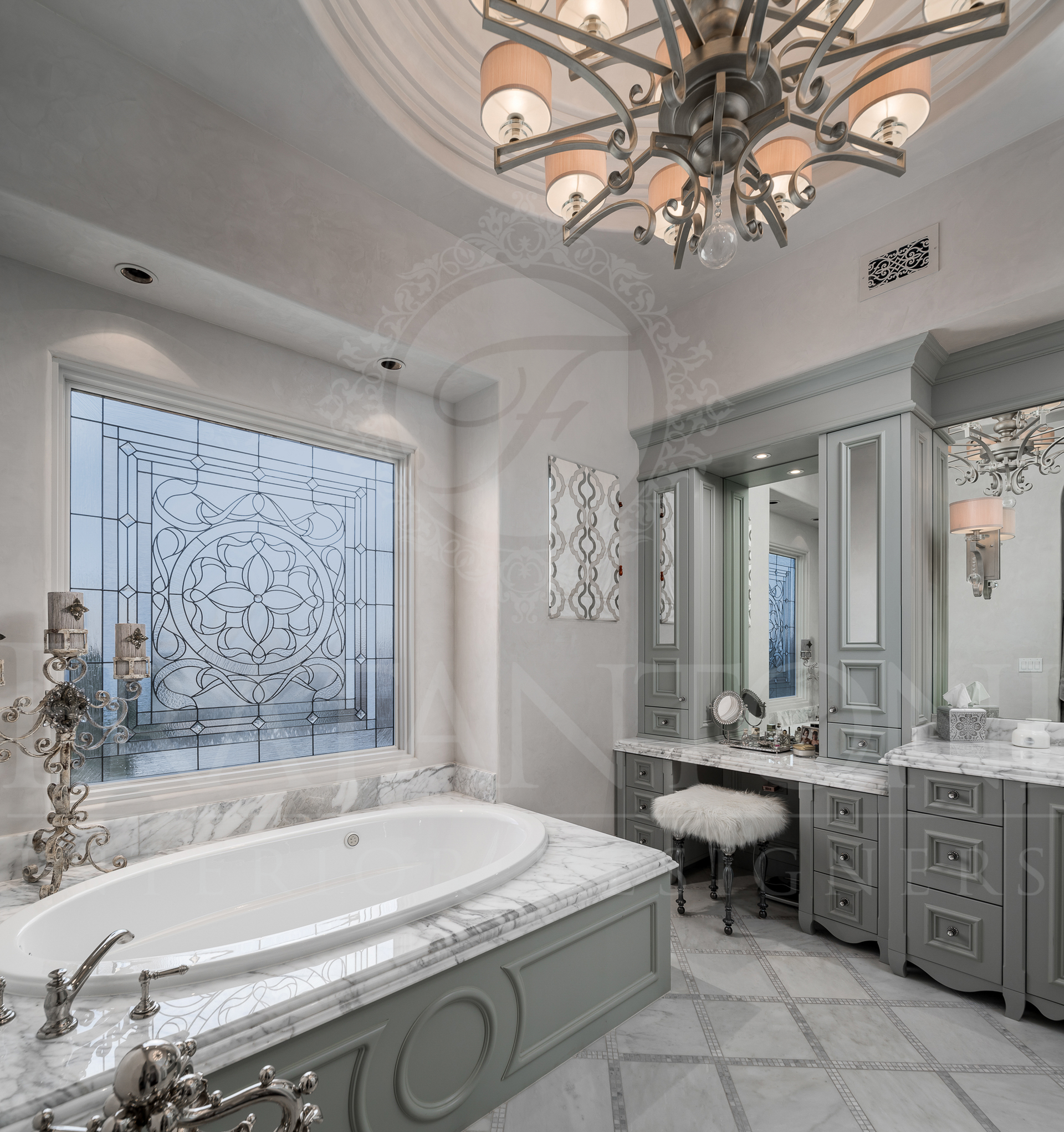 Elegant gray and white bathroom with a tub, vanity, and chandelier, featuring a city view window.