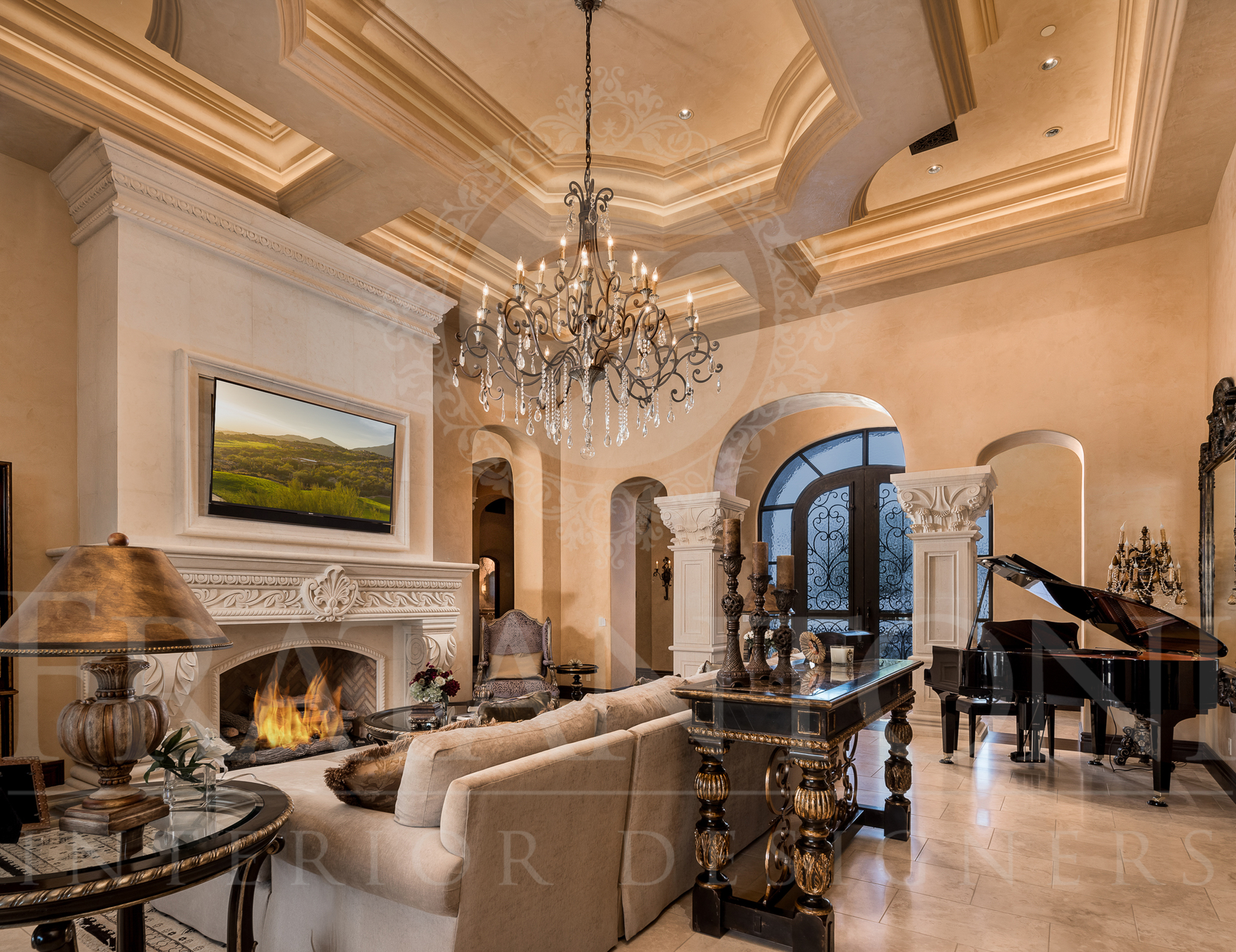 Luxurious living room with fireplace, chandelier, piano, and ornate details in cream and gold.