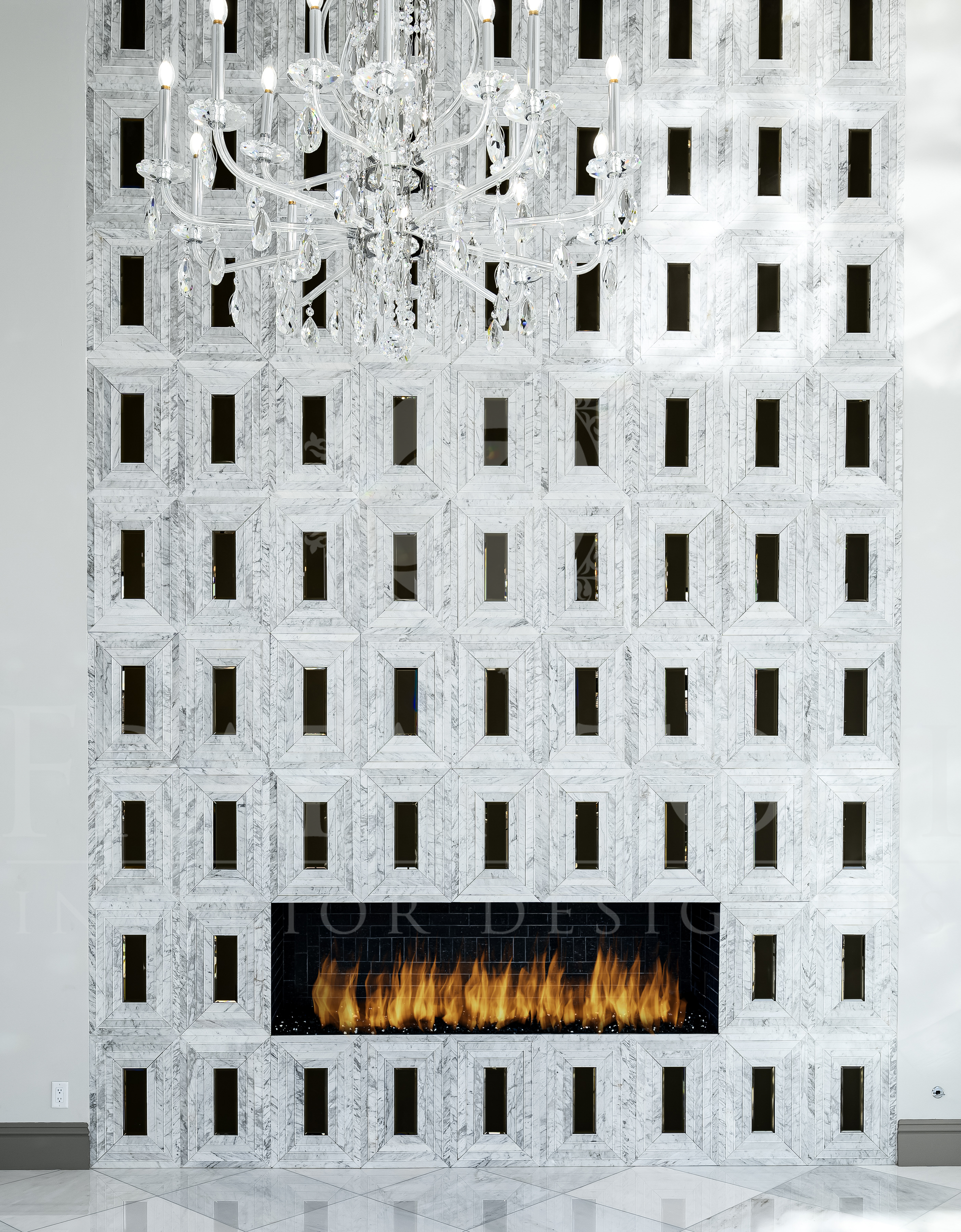 Custom luxury fireplace with mosaic tile detail in elegant great room designed by Fratantoni Interior Designers
