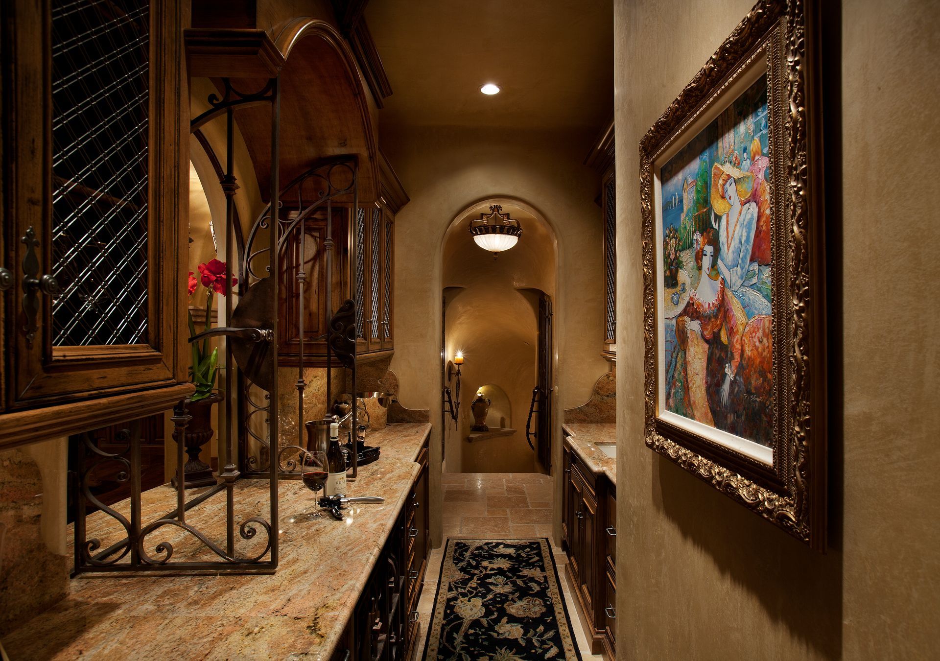 A hallway in a house with a painting on the wall