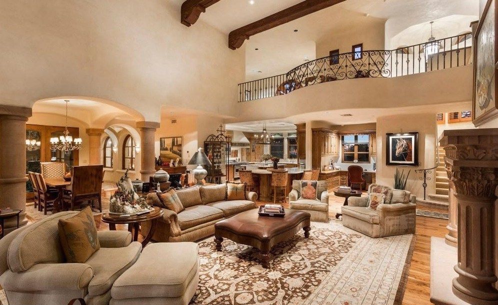 A living room filled with furniture and a fireplace