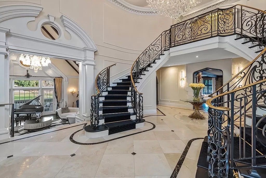 There is a large staircase in the middle of the room.