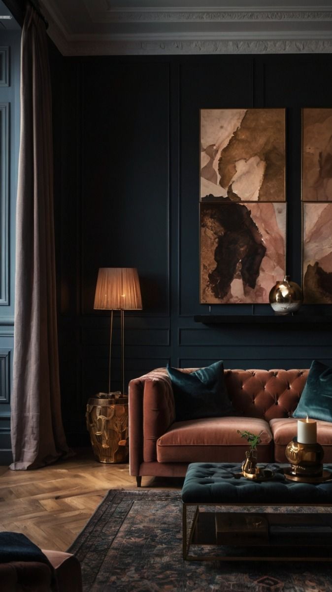 A living room with a couch , coffee table , and paintings on the wall.