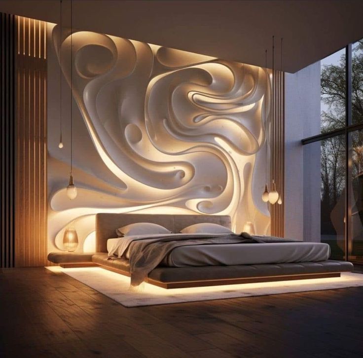 A bedroom with a bed and a wall with a design on it