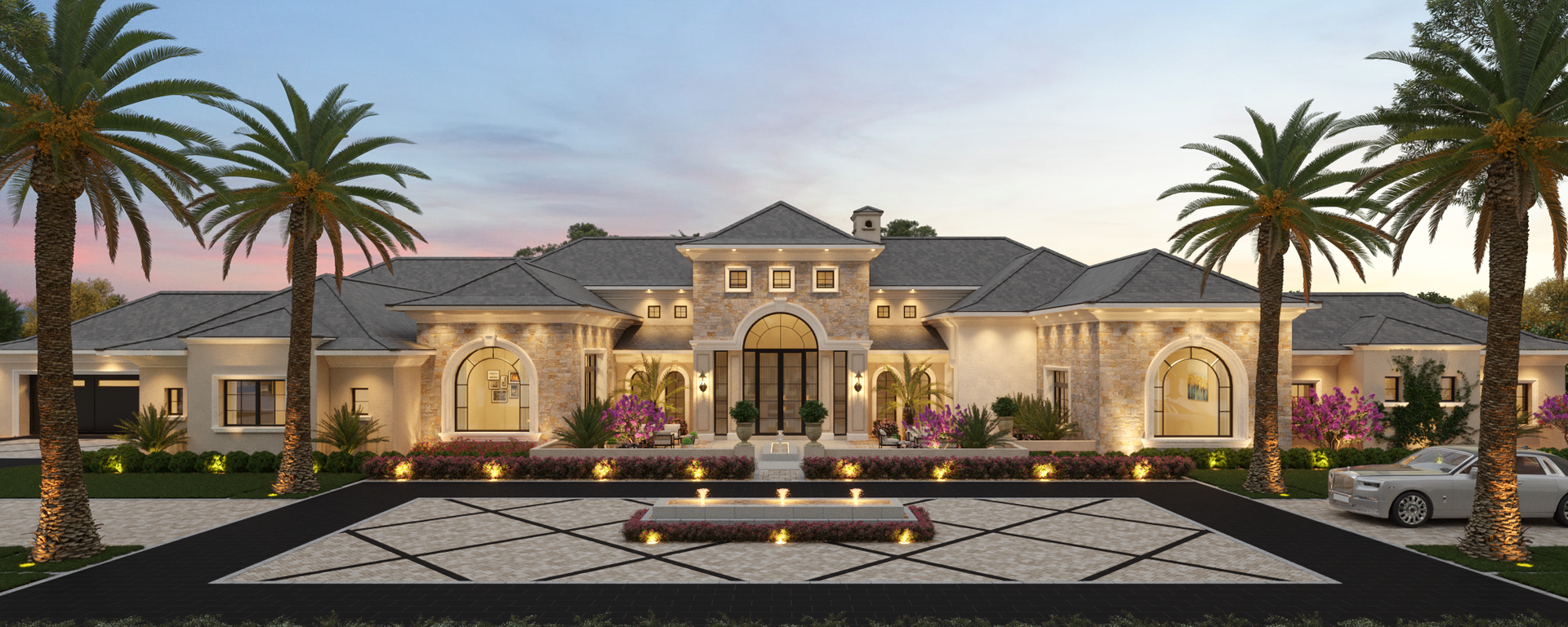 Luxury mansion with palm trees, lit fountains, and a stone driveway. Dusk sky, with cars parked at the side.