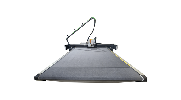 Large, industrial flatbed cutting machine; black, with conveyor belt and articulated arm.