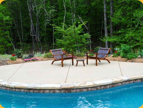 concrete patio by pool