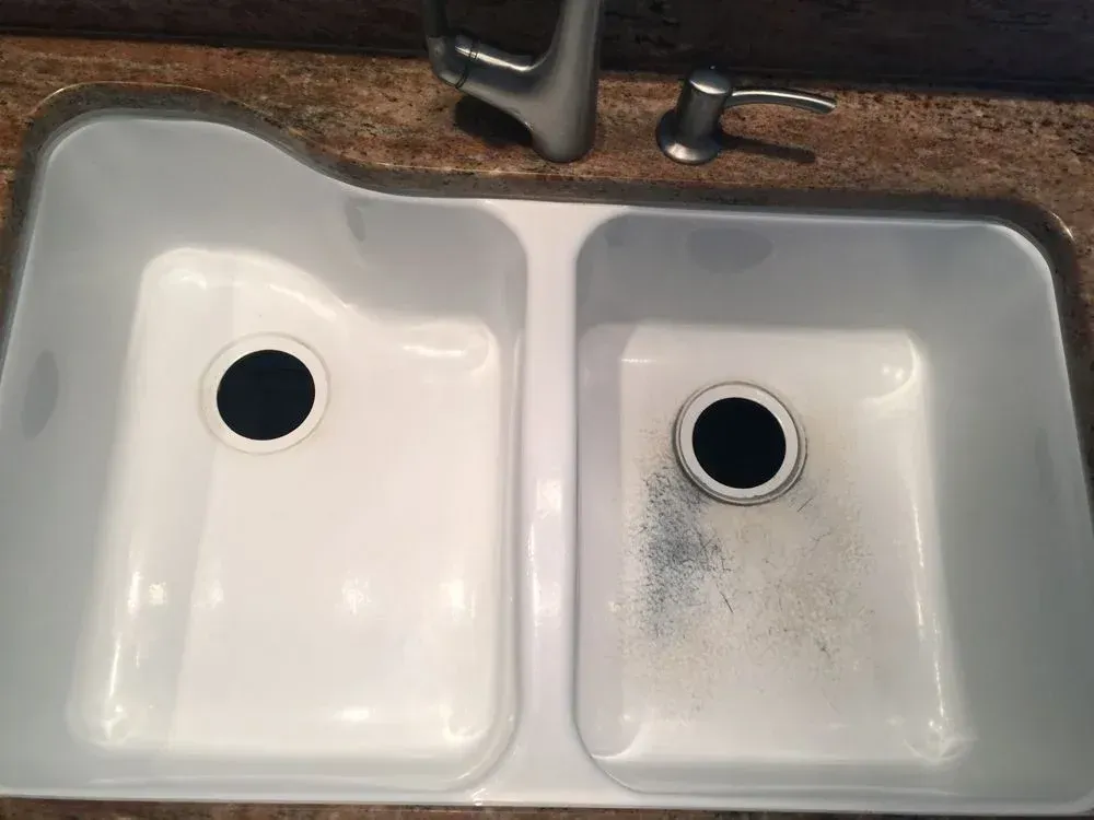 dirty worn sink in need of refinishing