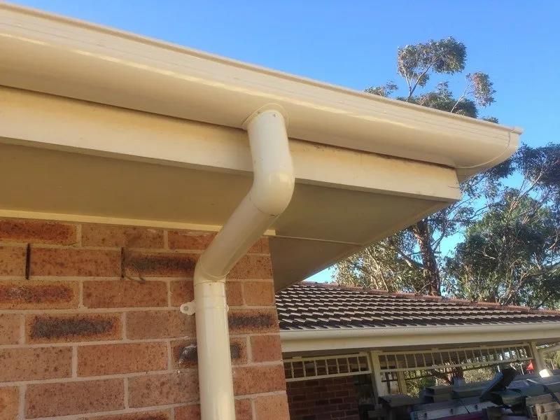 A Close Up of a Gutter on the Roof of a House — Coast Metal Roof & Gutter In Tumbi Umbi, NSW
