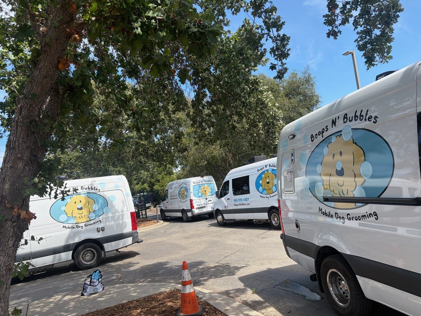 Boops N' Bubbles mobile grooming vans parked on the grounds of the East County Shelter in Dublin, CA
