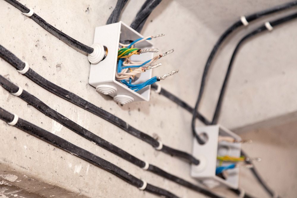Bunch Of Wires Are Connected To A Wall — Max Fox Electrical in Narrabri, NSW