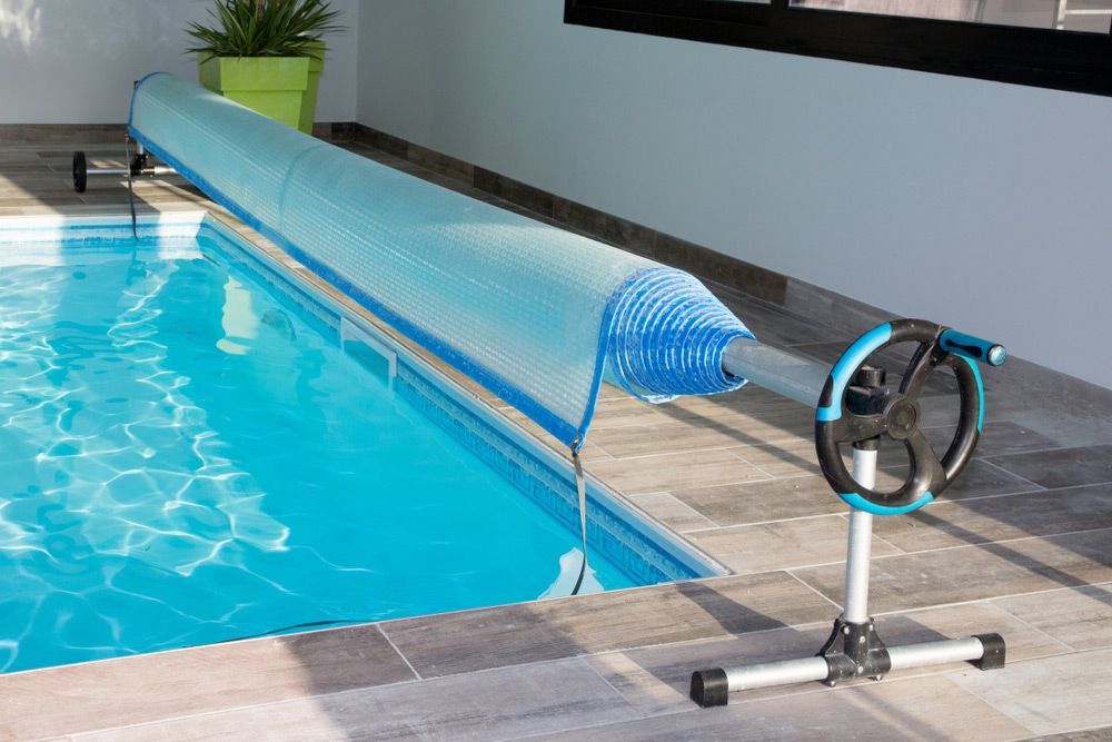 Swimming Pool Cover Blue Bubble Solar Equipment For Hot Water — Max Fox Electrical in Armidale, NSW