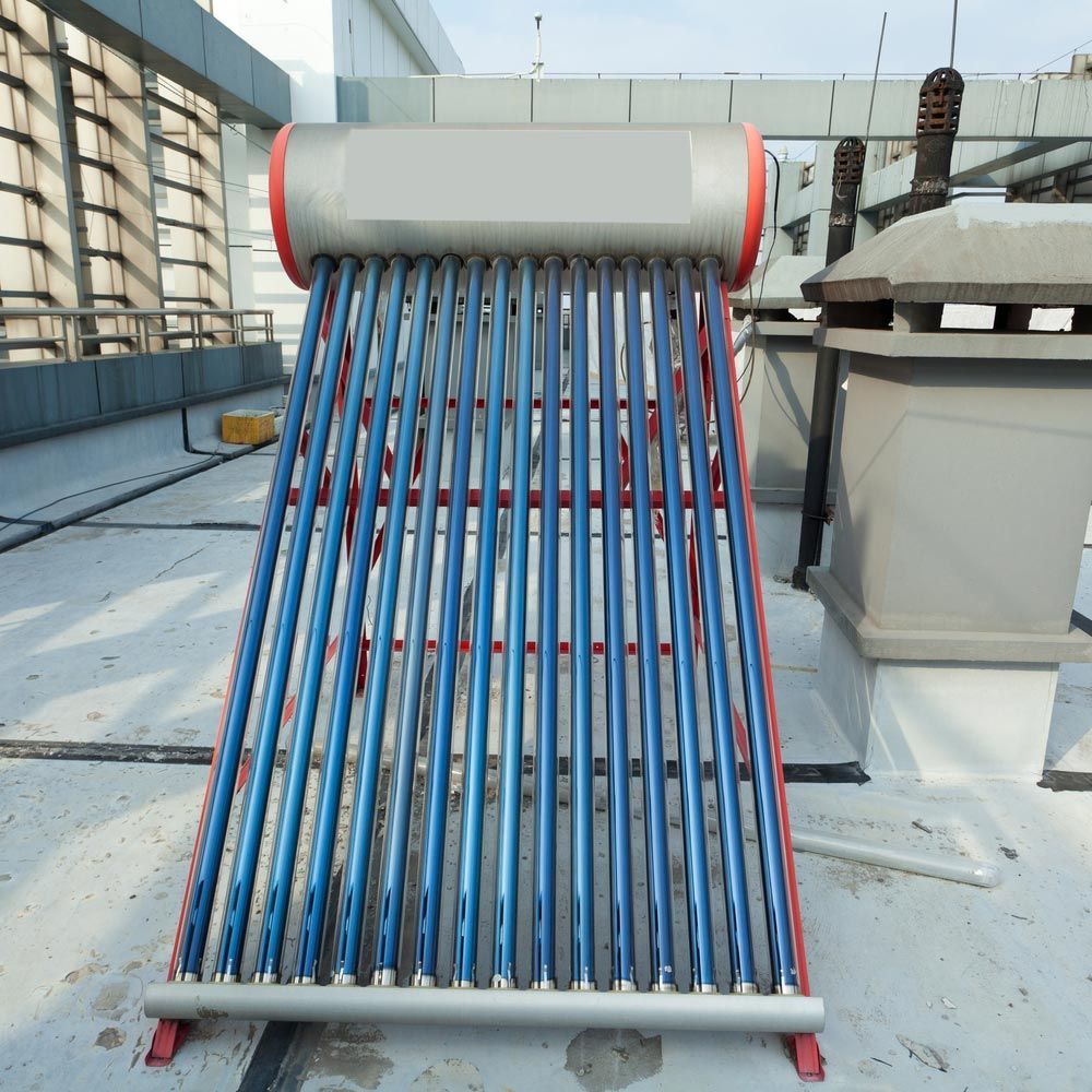 A Solar Water Heater Is On The Roof Of A Building — Max Fox Electrical in Armidale, NSW